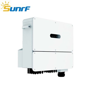 How does a three - phase hybrid inverter manage the state of charge of the batteries?